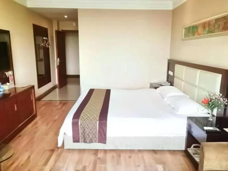 Bed in GreenTree Inn Hubei Huanggang Hong An Wal-Mart Plaza Business Hotel