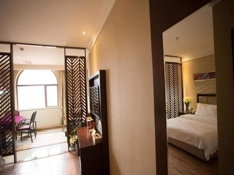 Bed in GreenTree Inn Hubei Huanggang Hong An Wal-Mart Plaza Business Hotel