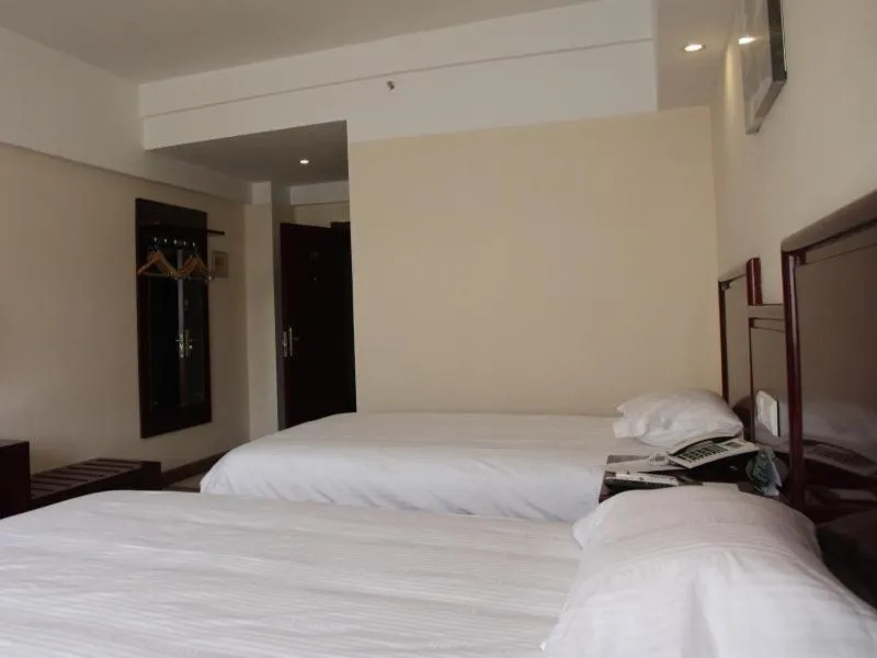 Bed in Greentree Inn Yunnan Lijiang Railway Station Yuxing Road Express Hotel
