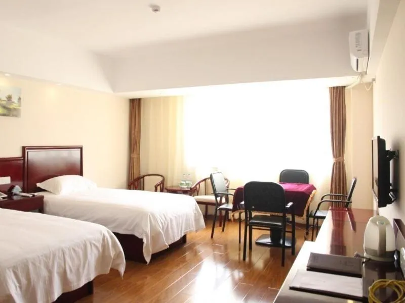 Bed in Greentree Inn Yunnan Lijiang Railway Station Yuxing Road Express Hotel