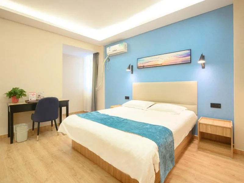 Bed in GreenTree Inn Henan Kaifeng Gulou Square Express hotel