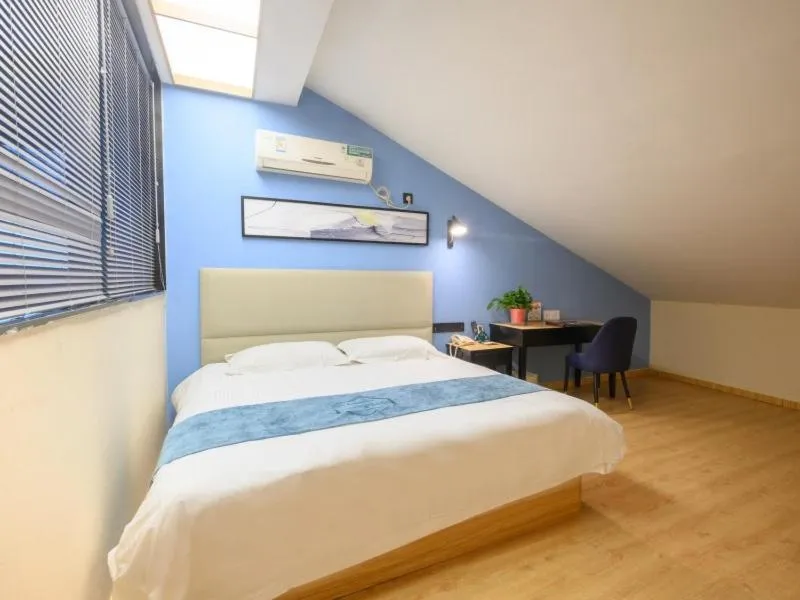 Bed in GreenTree Inn Henan Kaifeng Gulou Square Express hotel