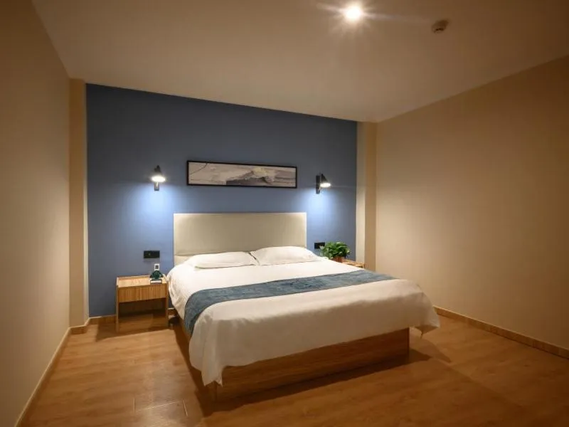 Bed in GreenTree Inn Henan Kaifeng Gulou Square Express hotel