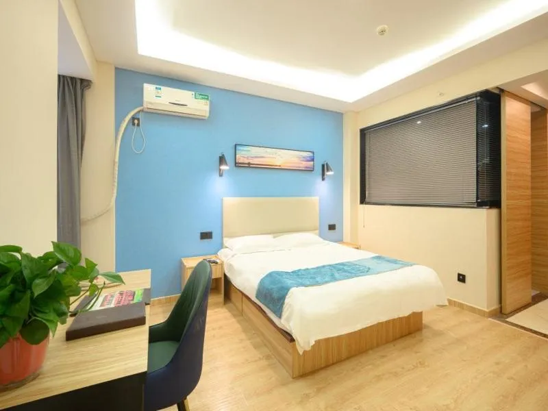 Bed in GreenTree Inn Henan Kaifeng Gulou Square Express hotel