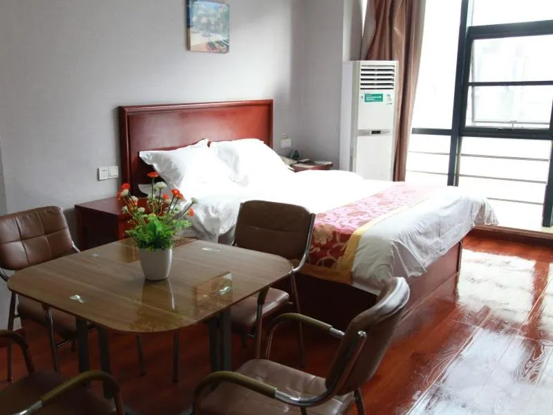Bed in GreenTree Inn Jiangsu Wuxi Xibei Town Xingtiandi Shell Hotel
