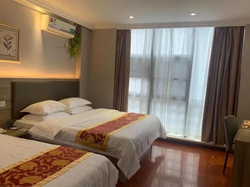 Bed in GreenTree Inn Jiangsu Wuxi Xibei Town Xingtiandi Shell Hotel