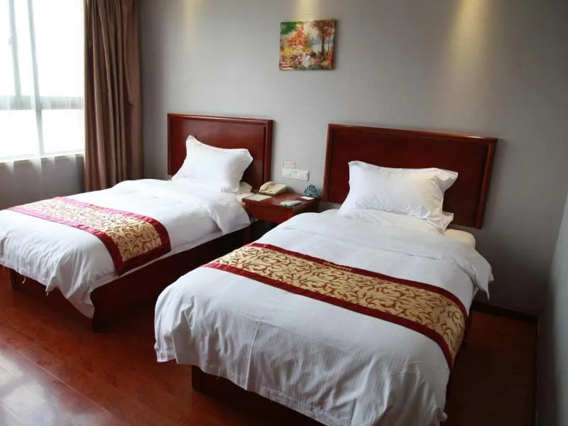 Bed in GreenTree Inn Jiangsu Wuxi Xibei Town Xingtiandi Shell Hotel