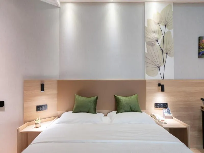 Bed in GreenTree Inn Jiangsu Wuxi Taihu Avenue Tongyang Road Express Hotel