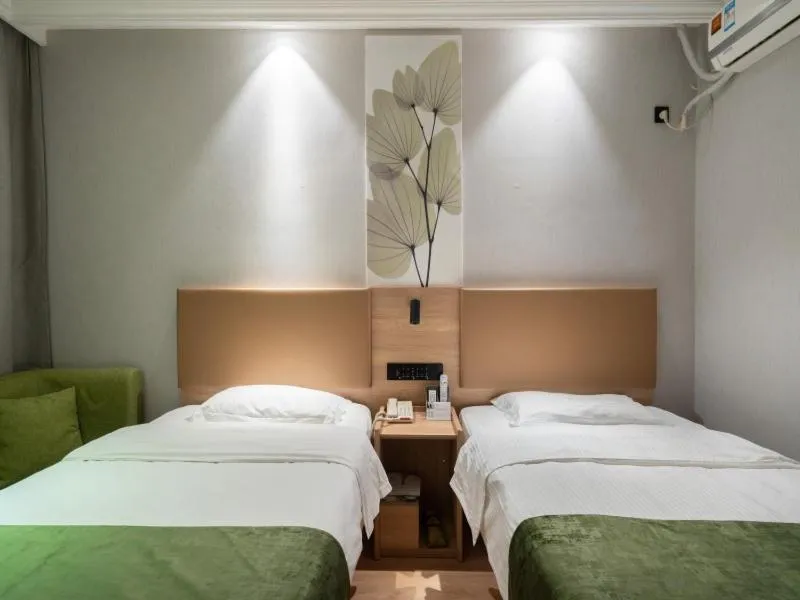 Bed in GreenTree Inn Jiangsu Wuxi Taihu Avenue Tongyang Road Express Hotel