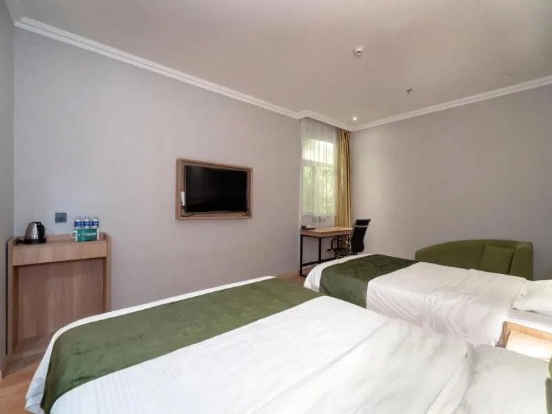 Bed in GreenTree Inn Jiangsu Wuxi Taihu Avenue Tongyang Road Express Hotel