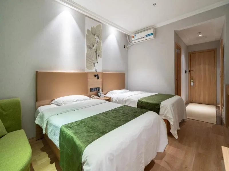 Bed in GreenTree Inn Jiangsu Wuxi Taihu Avenue Tongyang Road Express Hotel