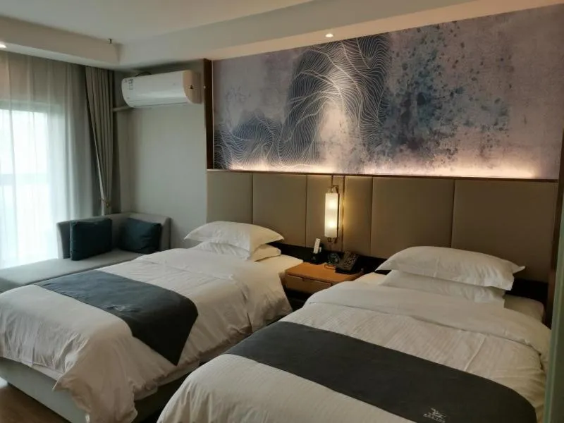 Bed in GreenTree Inn Jiangsu Wuxi Hudai FuAn Commercial Plaza Business Hotel