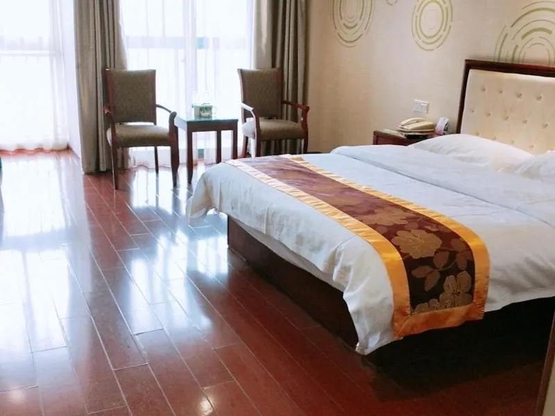 Bed in GreenTree Inn Jiangsu Wuxi Hudai FuAn Commercial Plaza Business Hotel