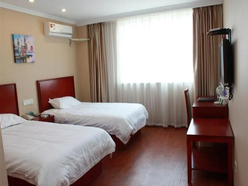 Bed in GreenTree Inn Jiangsu Suzhou Chang Shu Aotelaisi Business Hotel