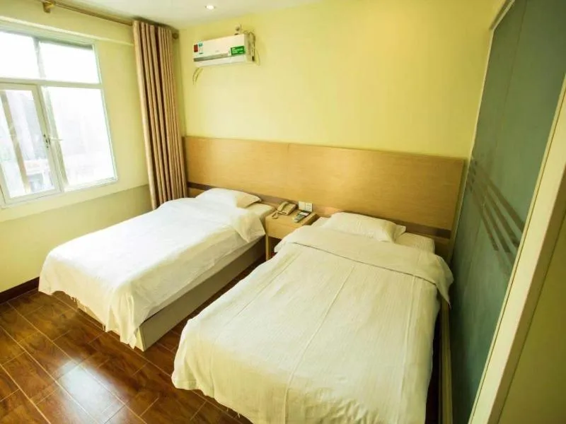 Bed in GreenTree Inn Jiangsu Nantong Haimen Bus Statian Shell Hotel