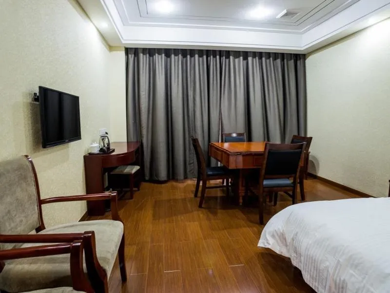 Bed in GreenTree Inn Jiangsu Nantong Haimen Sanchang North Wangjiang Road Business Hotel