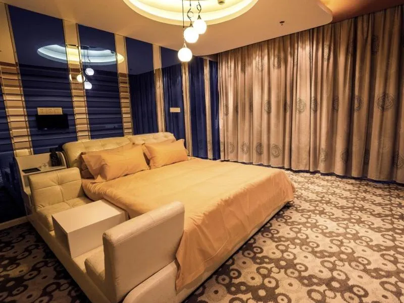 Bed in GreenTree Inn Jiangsu Nantong Haimen Sanchang North Wangjiang Road Business Hotel