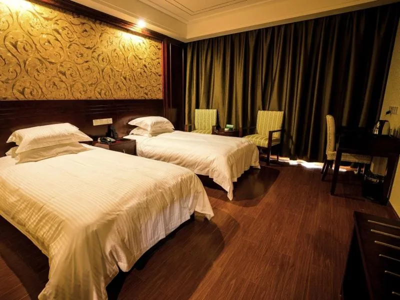 Bed in GreenTree Inn Jiangsu Nantong Haimen Sanchang North Wangjiang Road Business Hotel