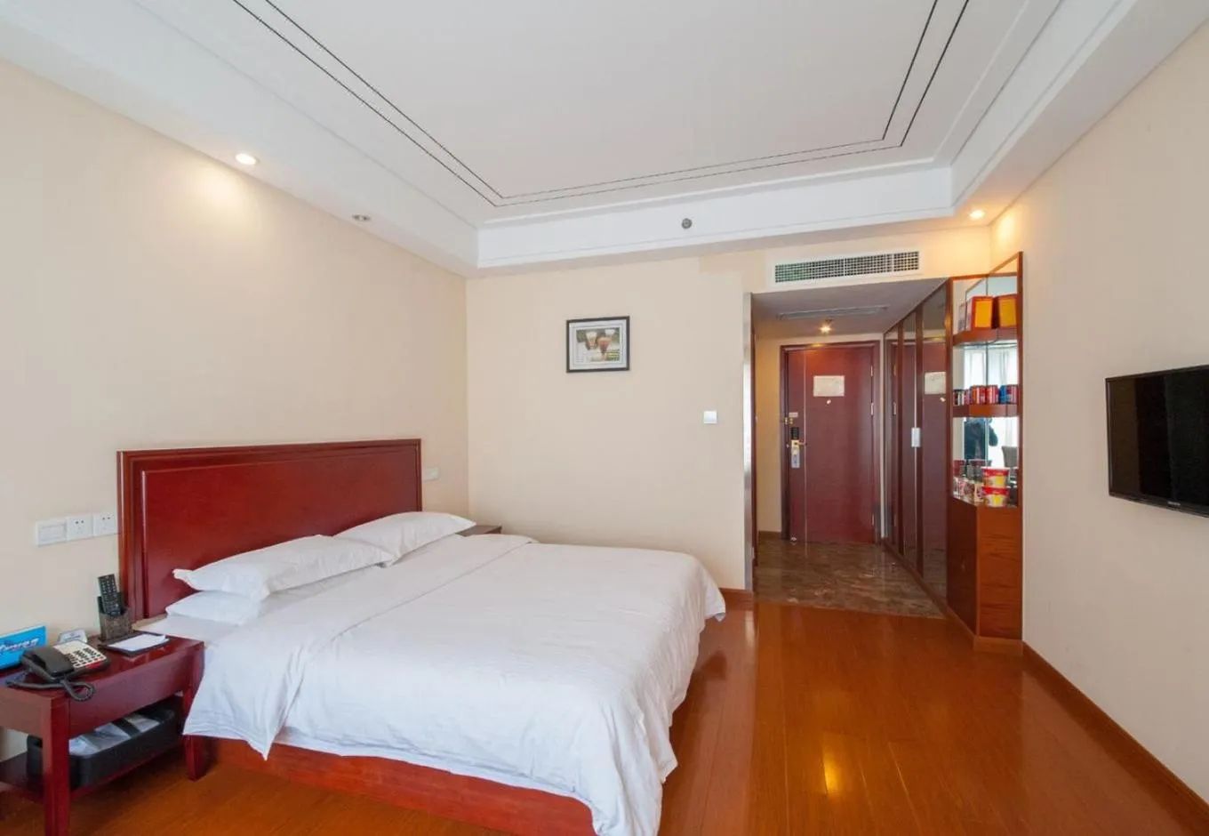 Bed in GreenTree Inn Jiangsu Nantong Haimen Sanchang North Wangjiang Road Business Hotel