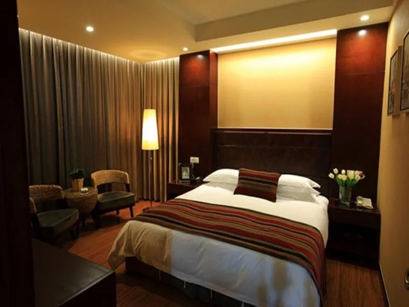 Bed in GreenTree Inn Jiangsu Nantong Qidong Middle Heping Road Business Hotel
