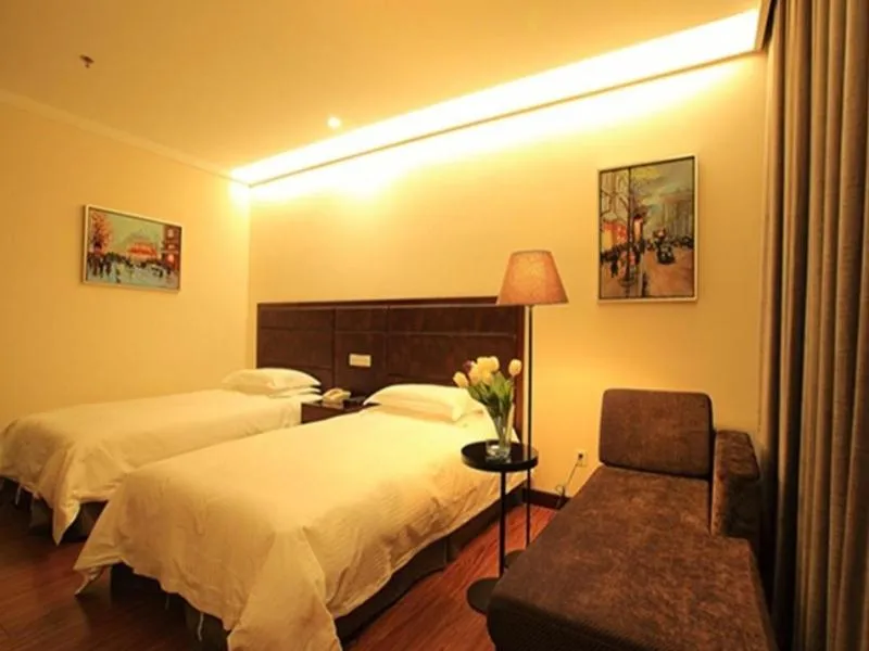 Bed in GreenTree Inn Jiangsu Nantong Qidong Middle Heping Road Business Hotel