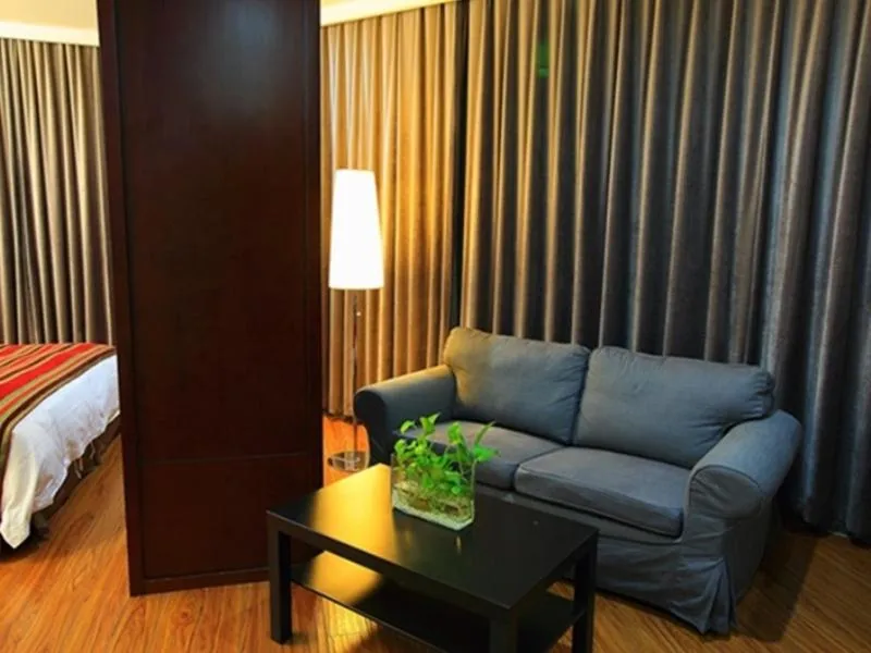 Bed in GreenTree Inn Jiangsu Nantong Qidong Middle Heping Road Business Hotel