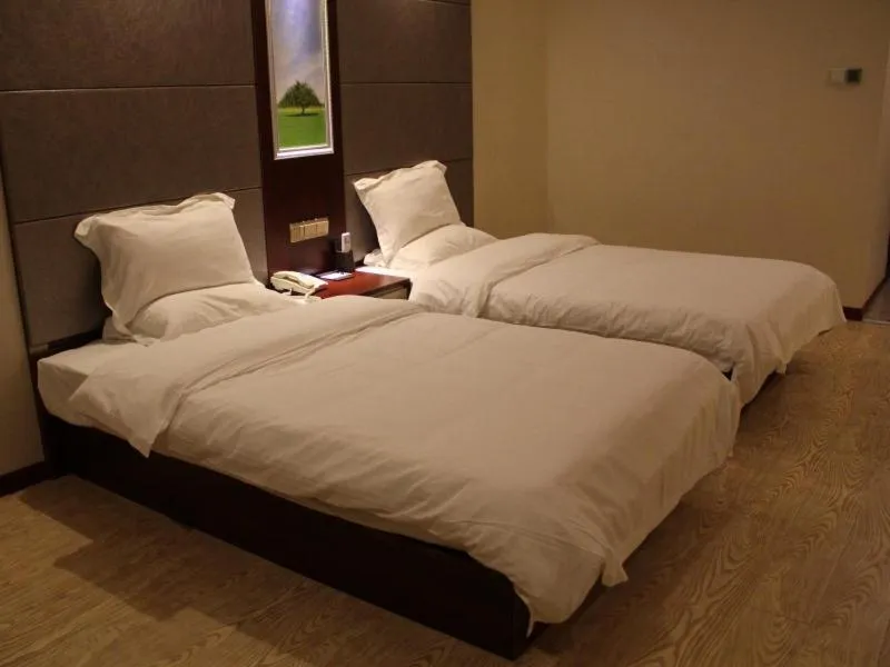 Bed in GreenTree Inn Jiangsu Nantong Tongzhou Shiji Avenue Jianghaihuangdu Express Hotel
