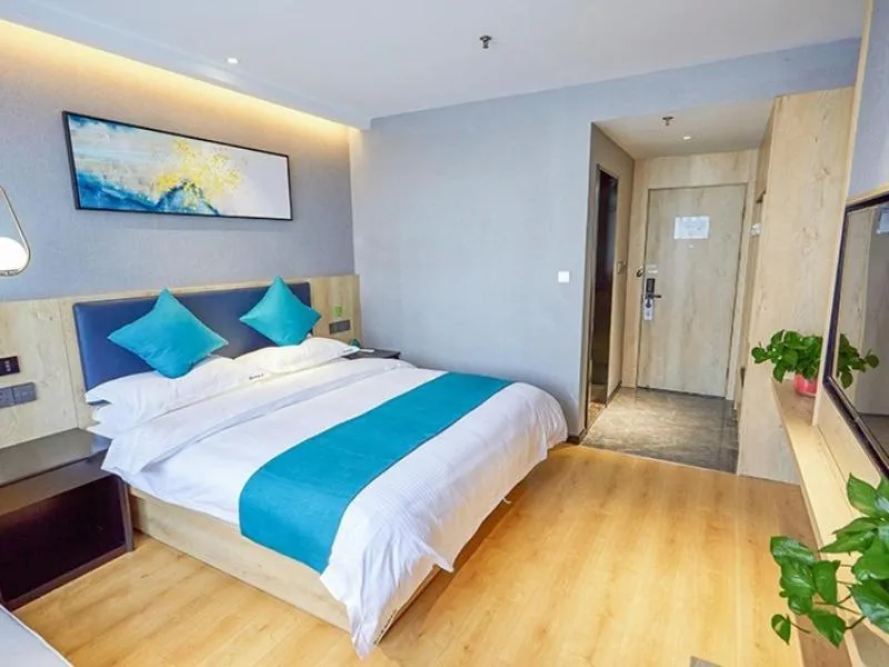 Bed in GreenTree Inn Jiangsu Nantong Textile City Bus Station Express Hotel