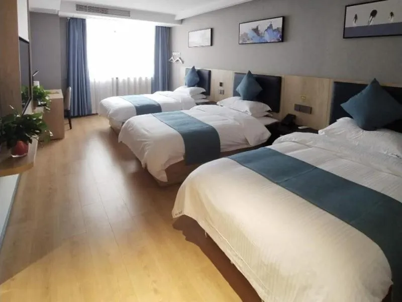 Bed in GreenTree Inn Jiangsu Nantong Textile City Bus Station Express Hotel