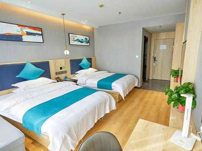 Bed in GreenTree Inn Jiangsu Nantong Textile City Bus Station Express Hotel