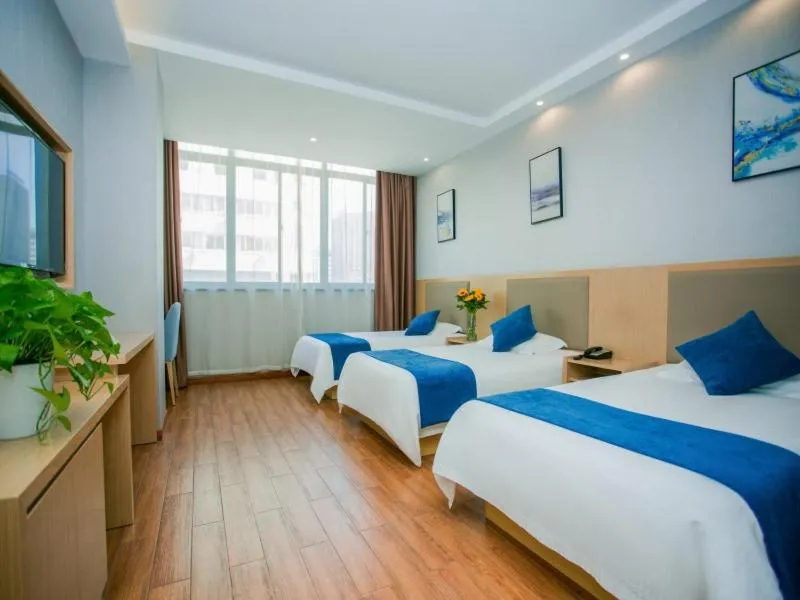 Bed in GreenTree Inn Nantong Hai'an Mingzhu City Express Hotel