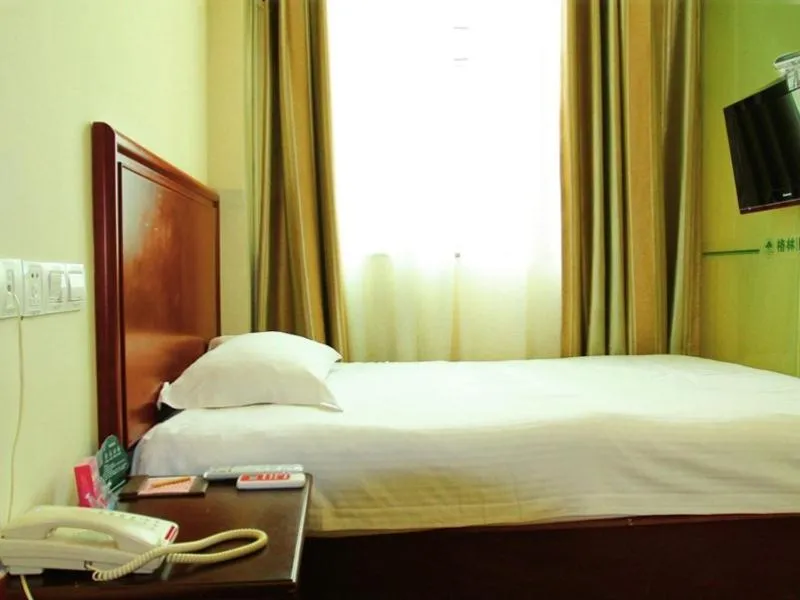Bed in GreenTree Inn Jiangsu Nantong Rugao Ninghai Road Express Hotel