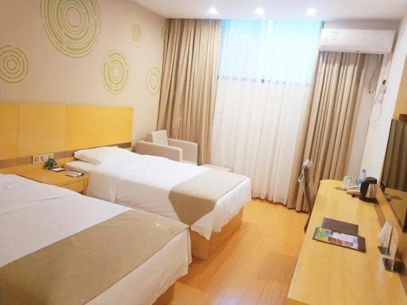 Bed in GreenTree Inn Jiangsu YangZhou Mansions Business Hotel