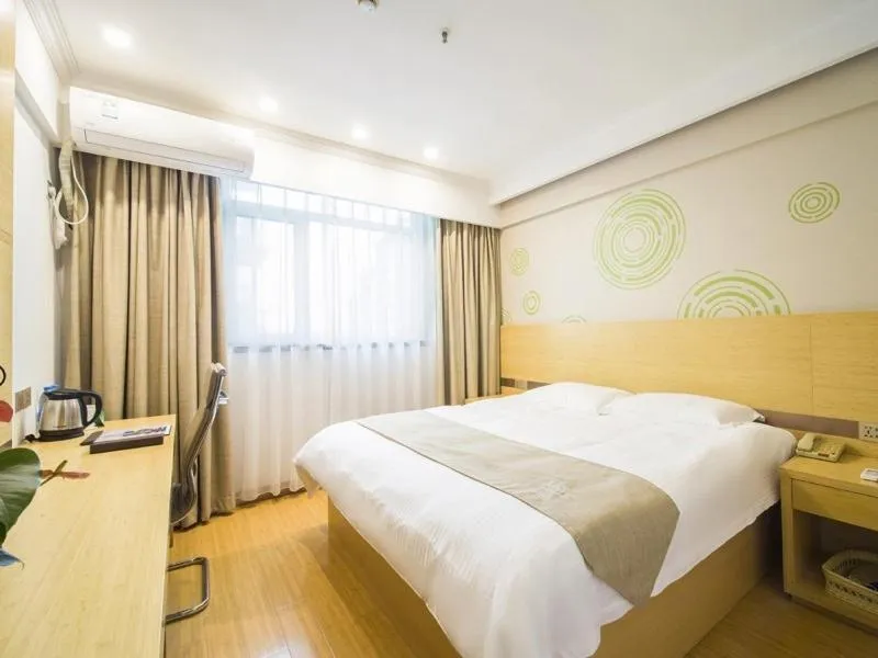 Bed in GreenTree Inn Jiangsu YangZhou Mansions Business Hotel