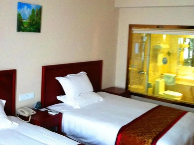 Bed in GreenTree Inn Jiangsu Yancheng Dongtai Jianggang Yingbin Road Gangcheng Avenue Business Hotel