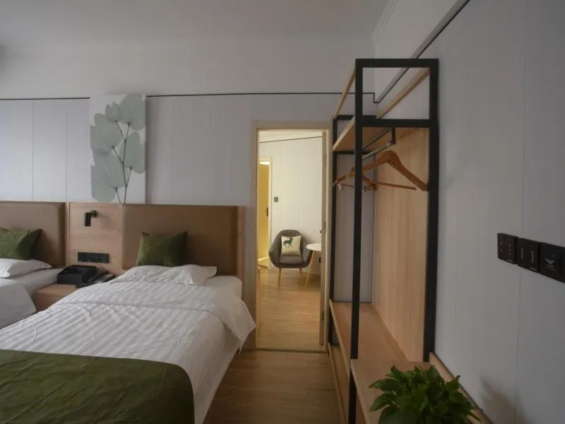 Bed in GreenTree Inn Jiangsu Lianyungang Guannan West Renmin Road Express Hotel