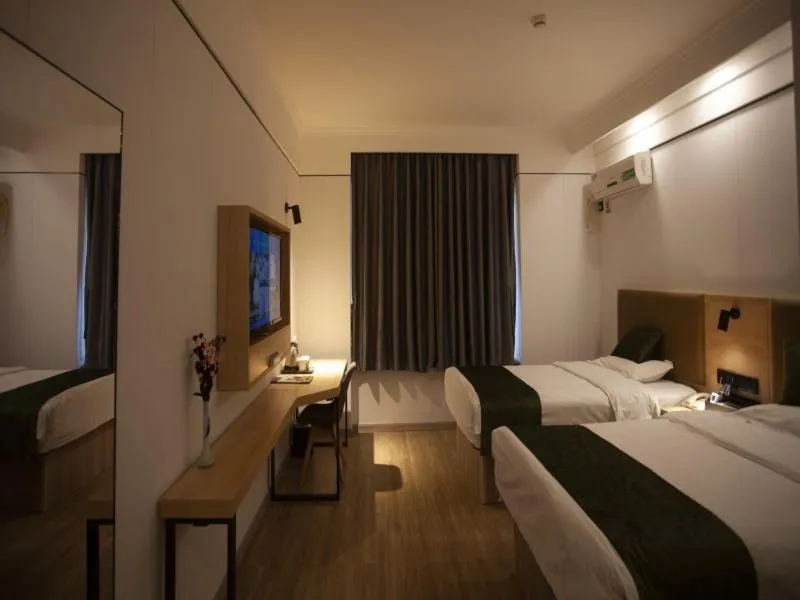 Bed in GreenTree Inn Jiangsu Lianyungang Guannan West Renmin Road Express Hotel