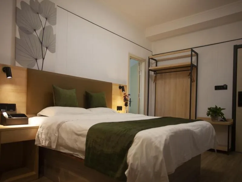 Bed in GreenTree Inn Jiangsu Lianyungang Guannan West Renmin Road Express Hotel
