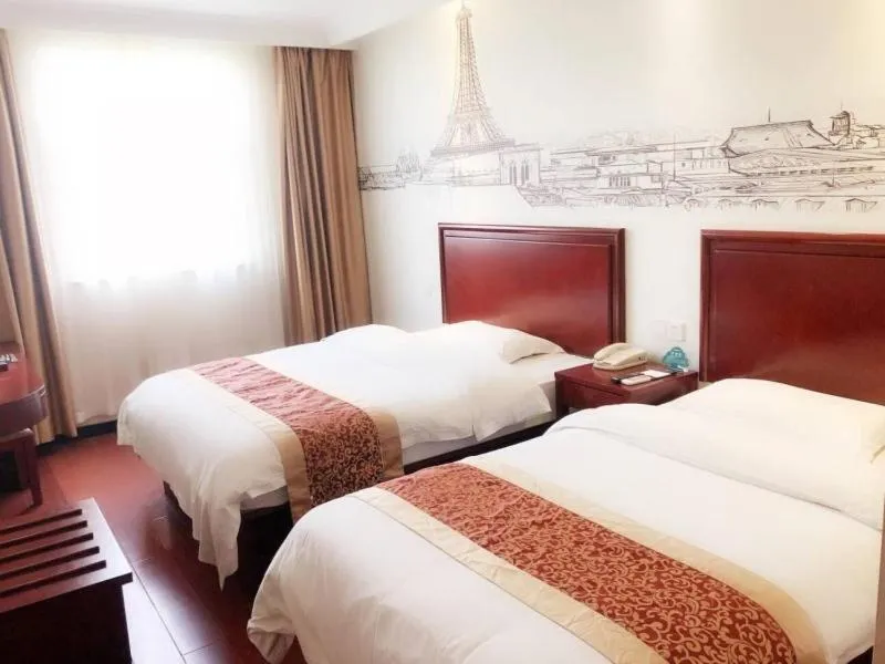 Bed in GreenTree Inn Jiangsu Lianyungang Donghai New Bus Station Express Hotel