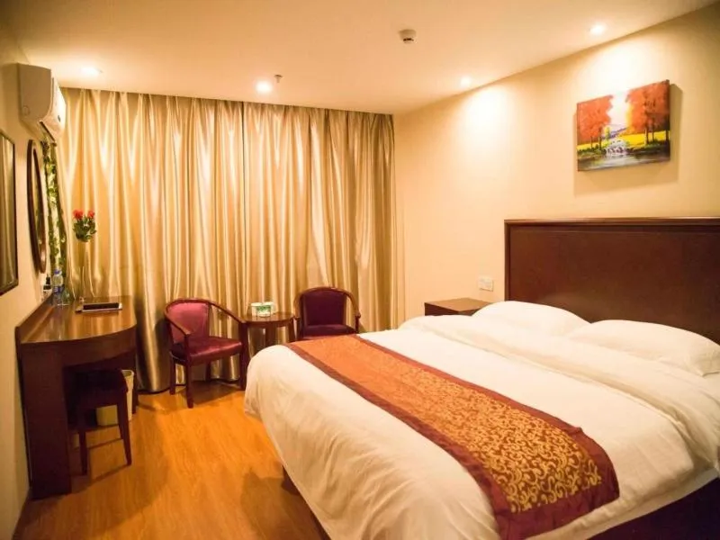 Bed in GreenTree Inn Jiangsu Taizhou Xinghua Anfeng Runan Garden Express Hotel