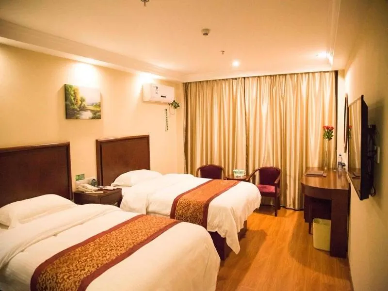 Bed in GreenTree Inn Jiangsu Taizhou Xinghua Anfeng Runan Garden Express Hotel