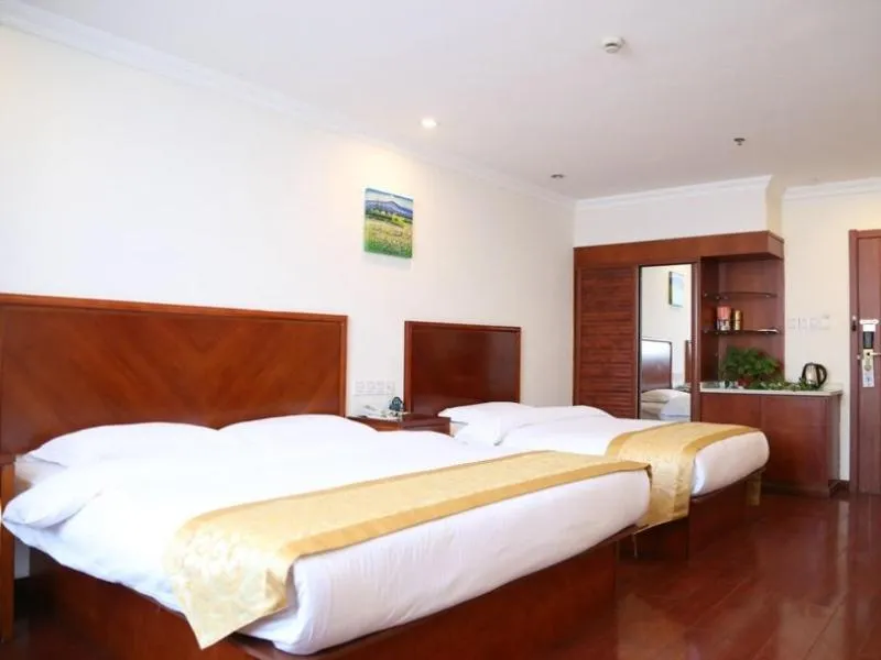 Bed in GreenTree Inn Jiangsu Taizhou Taidong Railway Station Business Hotel