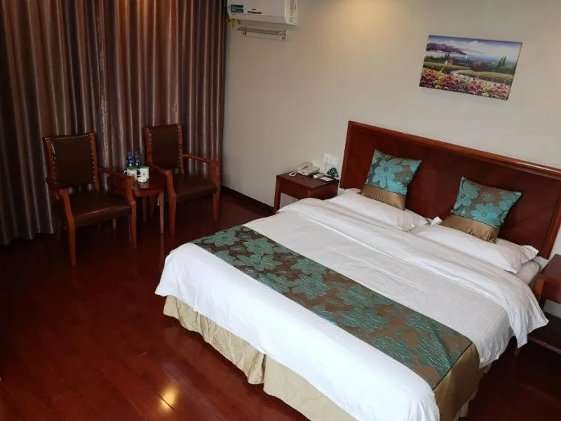Bed in GreenTree Inn Jiangsu Taizhou Taidong Railway Station Business Hotel