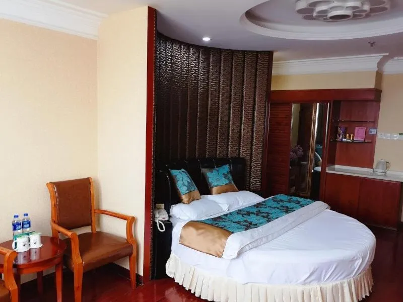 Bed in GreenTree Inn Jiangsu Taizhou Taidong Railway Station Business Hotel