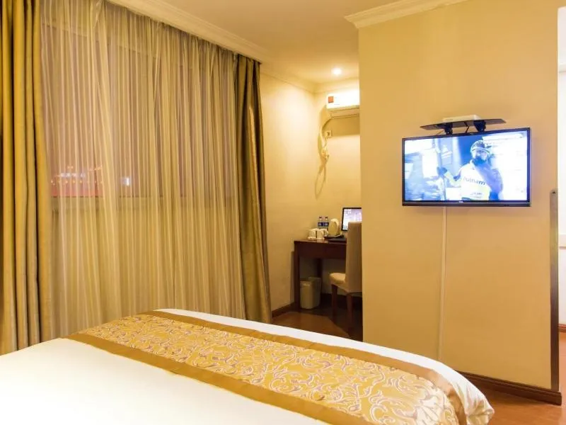 Bed in GreenTree Inn Jiangsu Taizhou Jingjiang Bus Station Express Hotel