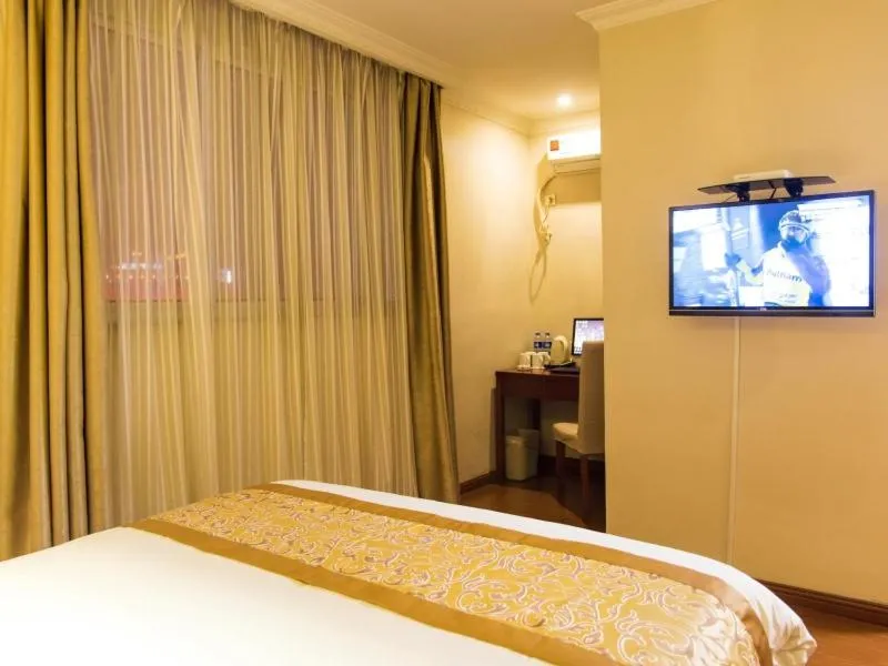 Bed in GreenTree Inn Jiangsu Taizhou Jingjiang Bus Station Express Hotel
