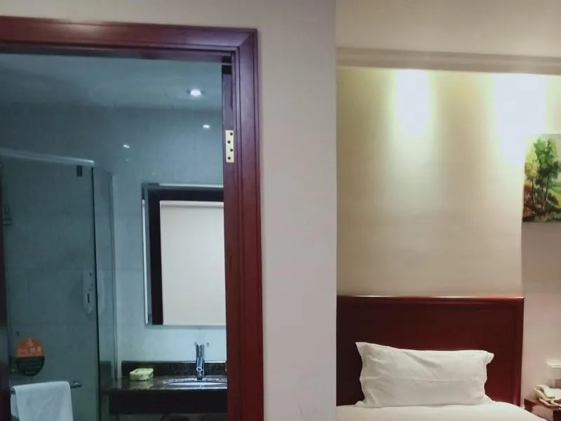 Bed in GreenTree Inn Jiangsu Taizhou Jingjiang Bus Station Express Hotel