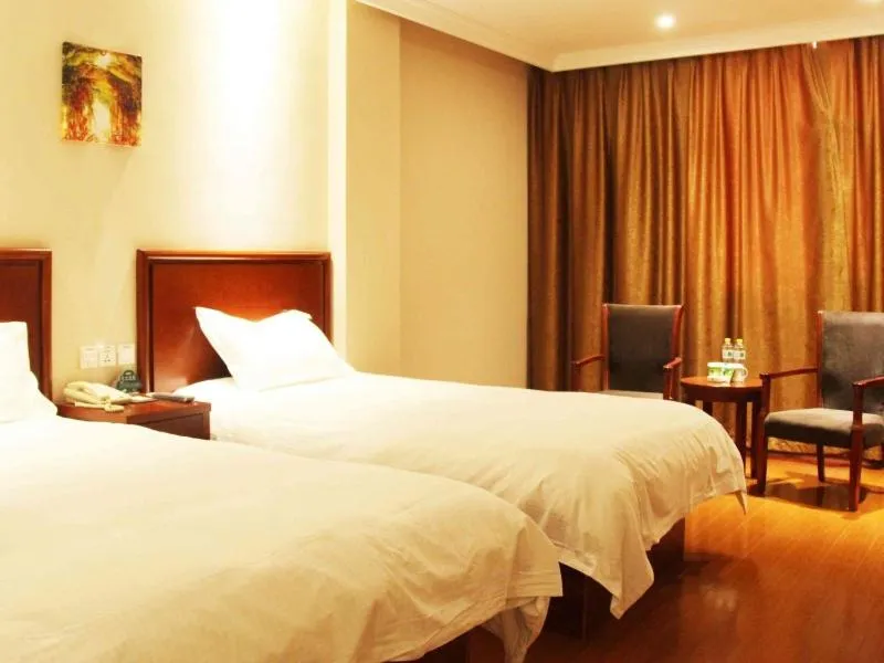 Bed in GreenTree Inn Shandong Qingdao Development District SDUST Express Hotel