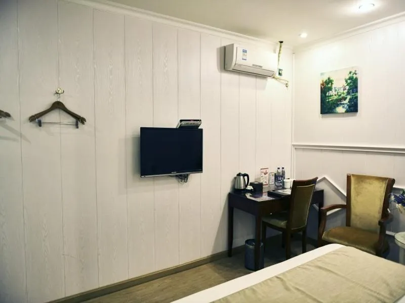 Bed in GreenTree Inn Guangdong Foshan Longjiang North Fenghua Road Express Hotel