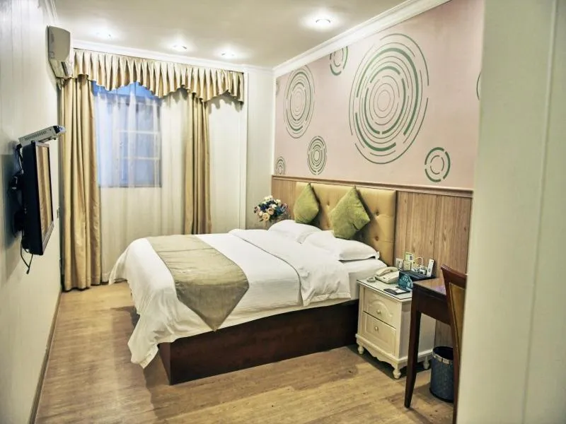 Bed in GreenTree Inn Guangdong Foshan Longjiang North Fenghua Road Express Hotel